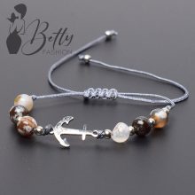 Márványmintás gyöngy és fémdíszes karkötő 