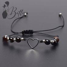 Márványmintás gyöngy és fémdíszes karkötő 