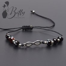 Márványmintás gyöngy és fémdíszes karkötő 