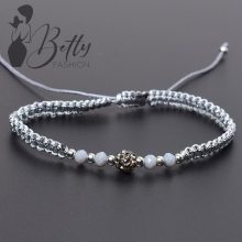 Cirkónia köves és gyöngydíszes, fonott karkötő