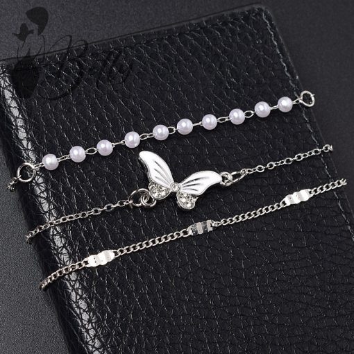 Strasszkő és gyöngydíszes, 3 részes karkötő szett