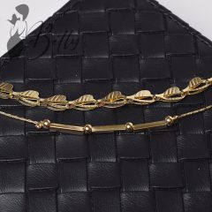 Áttört szív és gyöngydíszes karkötő