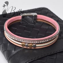 Strasszkő és fémdíszes karkötő