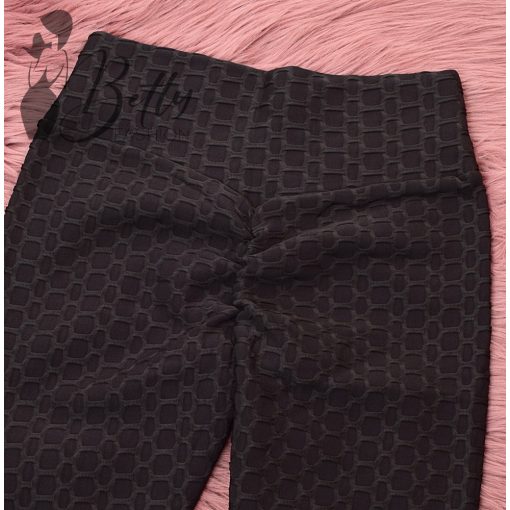 Fekete színű, anyagában mintás, műszőrme bélelt leggings M/L, XL/2XL